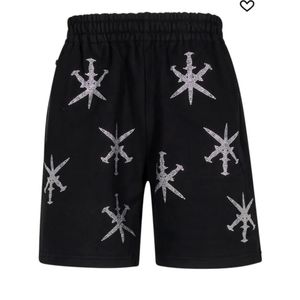 UNKNOWN RHINESTONE DAGGER TRACK SHORTS